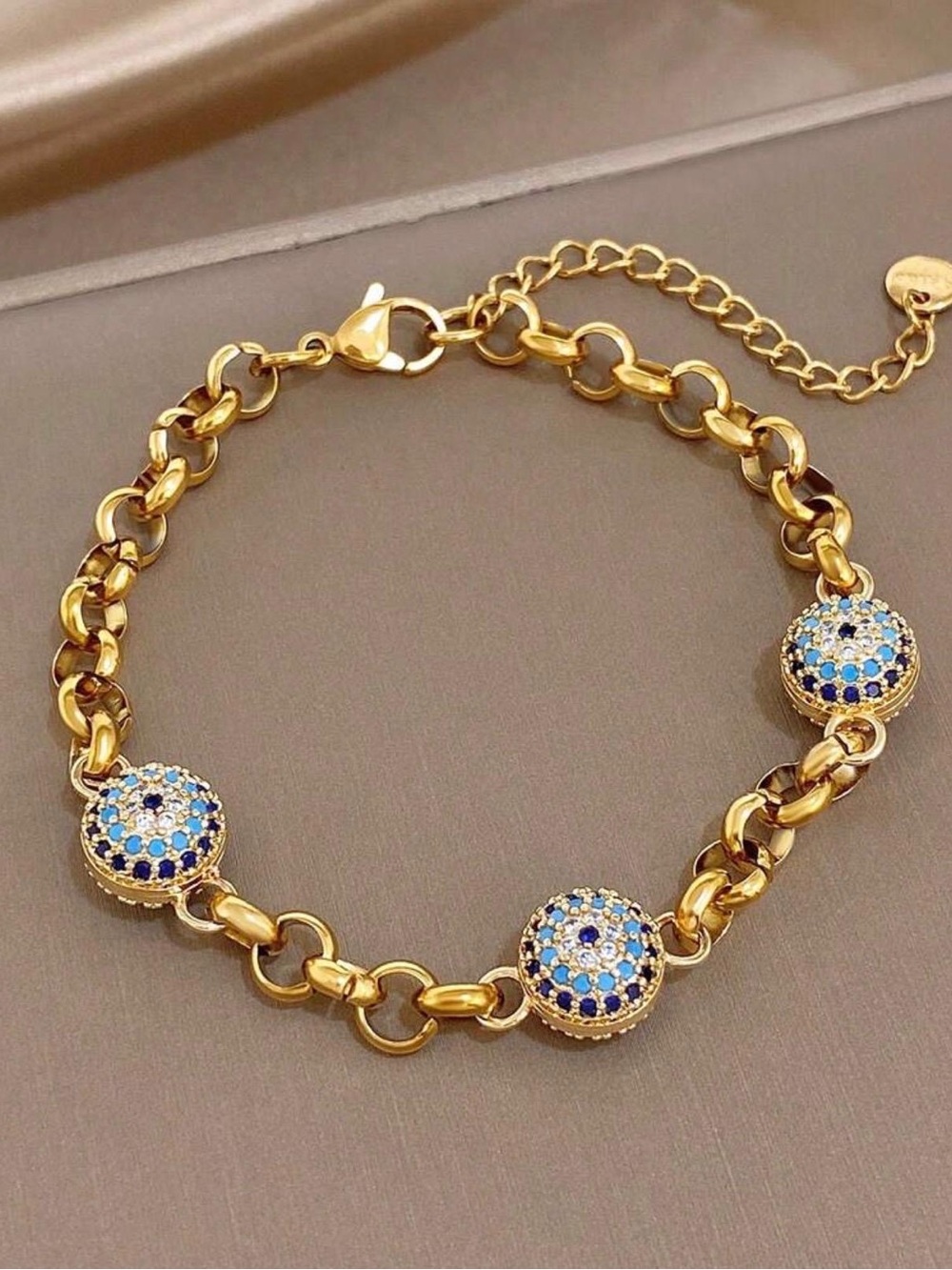 Gold-Tone Bracelet with Blue and White Crystal Discs